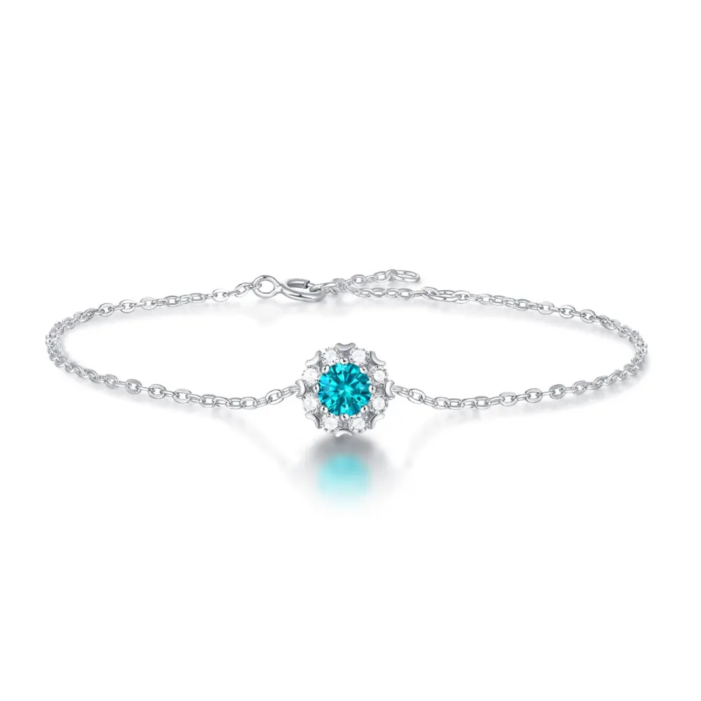 Stella Valentino Sterling Silver 0.50ctw Lab Created Moissanite & Blue Topaz Round Halo Station Charm Bracelet