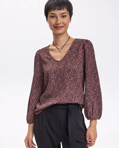 Blouse texturée en tricot à manches 3/4 et col V