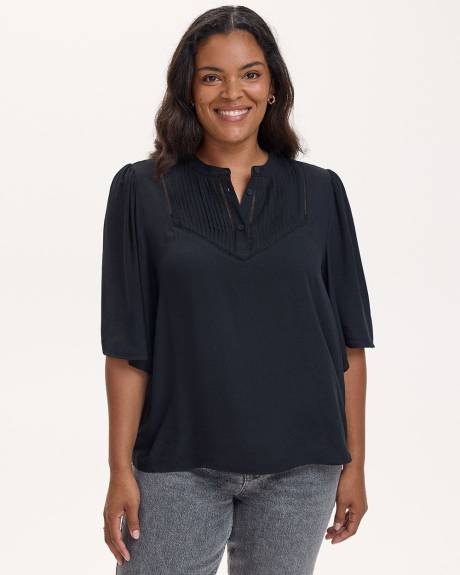 Blouse ample à manches courtes avec nervures et détails brodés