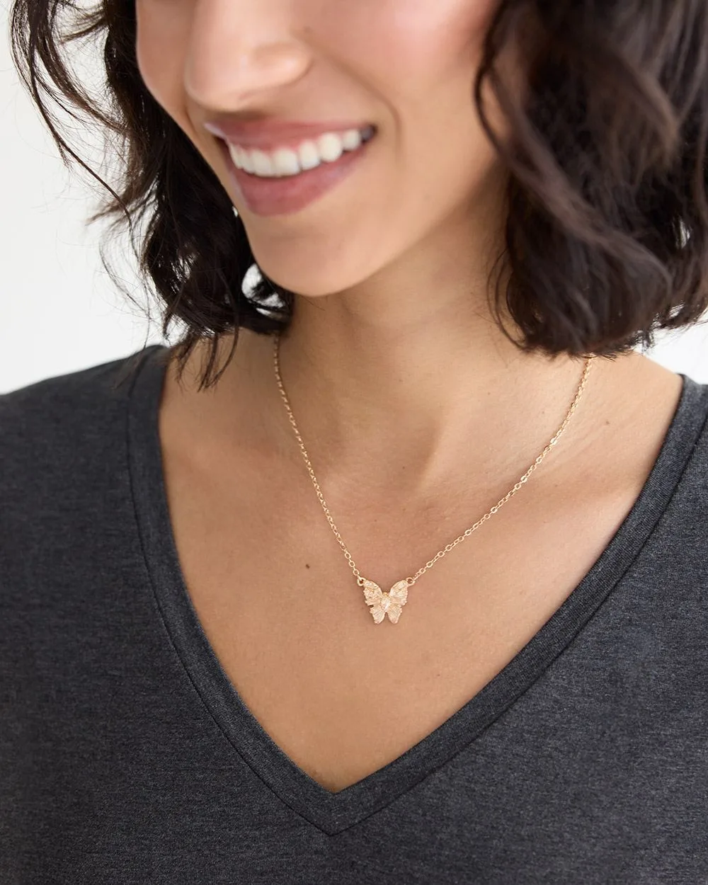 Short Necklace with Stone-Encrusted Butterfly Pendant