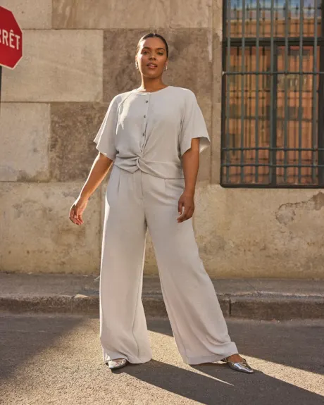 Blouse à manches courtes avec détail torsadé