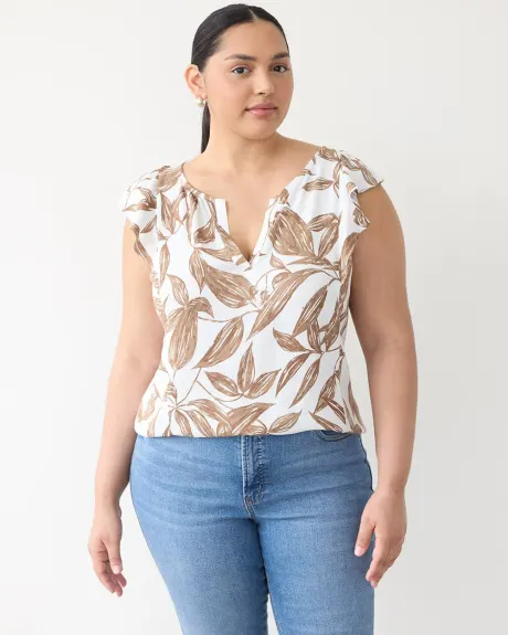 Blouse sans manches à encolure fendue et épaules à volants