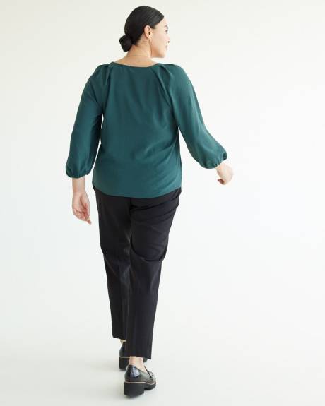 Blouse à manches longues et encolure dégagée