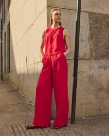 Blouse sans manches courtes avec boutons sur les côtés