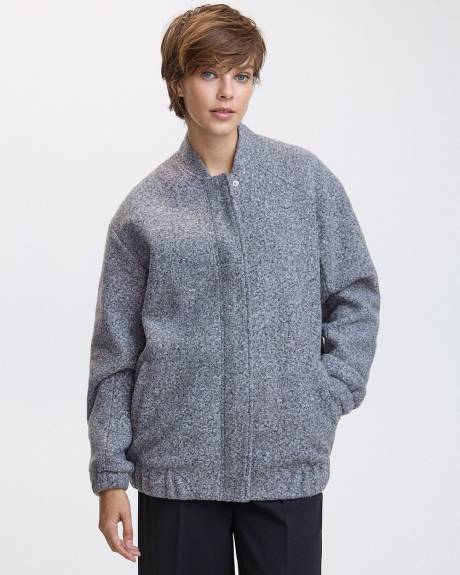 Manteau style aviateur en tricot bouclé