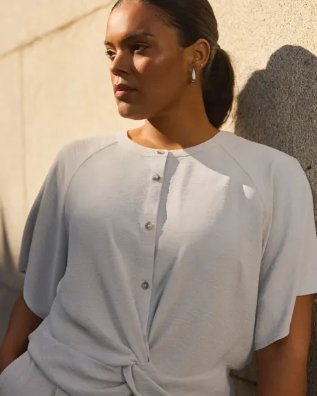 Blouse à manches courtes avec détail torsadé