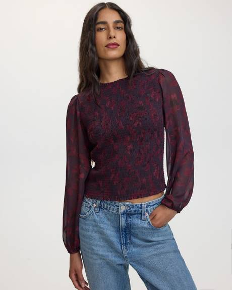 Blouse ajustée à manches longues et col rond avec détails en nid d'abeille